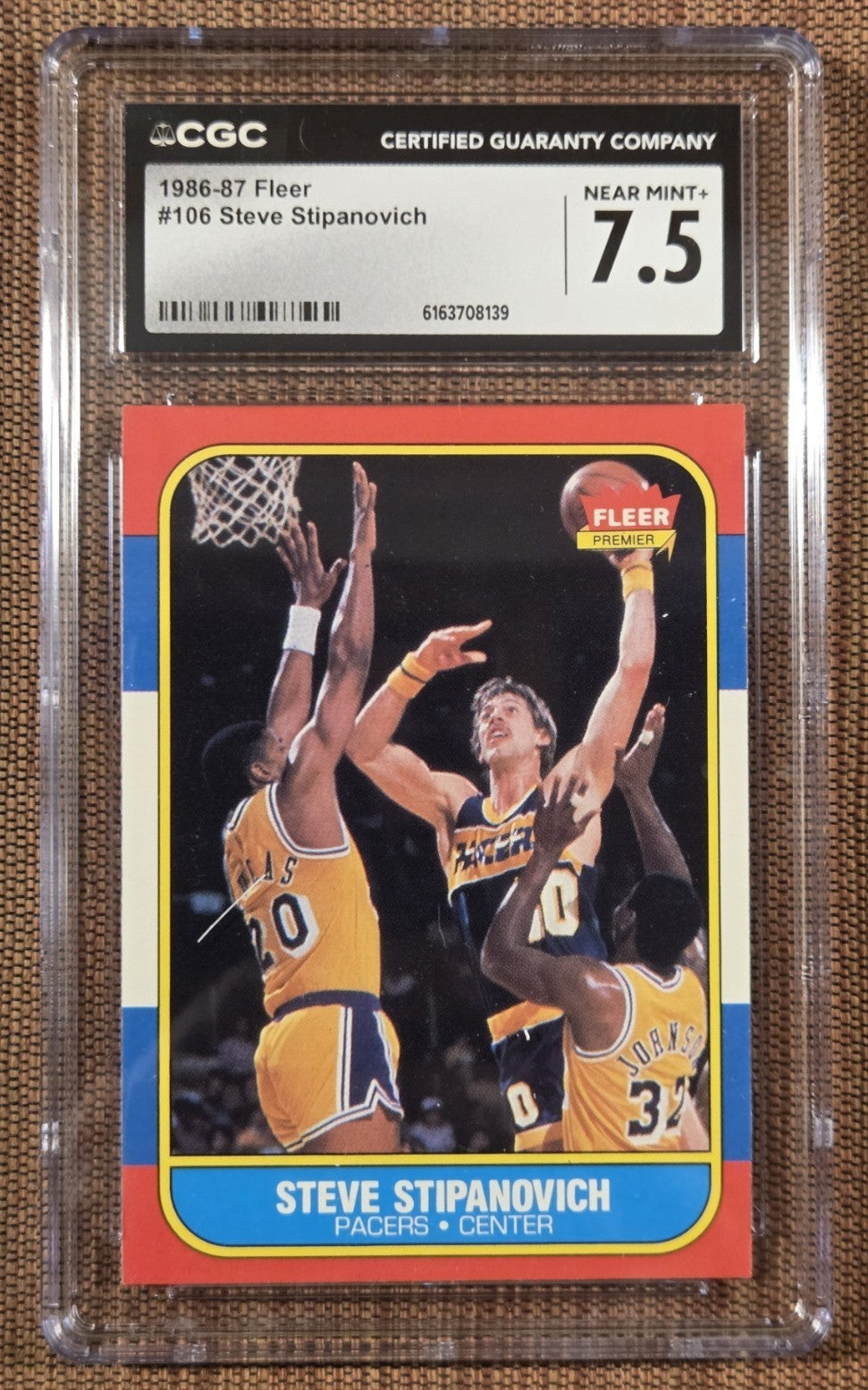 1986 Fleer #106 Steve Stipanovich Indiana Pacers Basketball Card CGC 7.5 NM+0