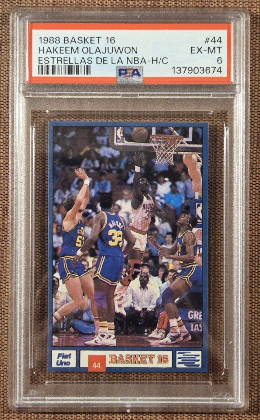 1988 Basket 16 Estrellas De La NBA #44 Hakeem Olajuwon Basketball Card PSA 60